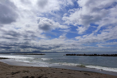 Scenic view of beach against sky