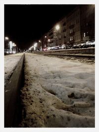 Illuminated street lights at night