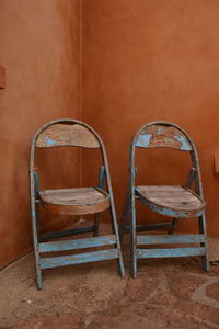 Empty chairs in abandoned room