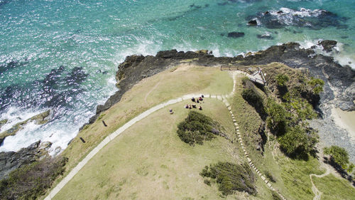 High angle view of mountain by sea