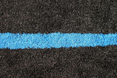 Close-up of blue road