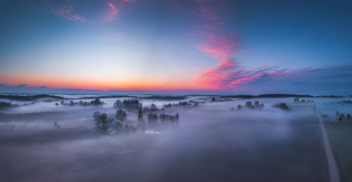 Scenic view of dramatic sky during sunset