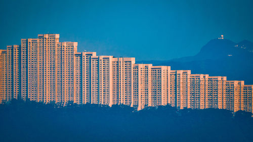 Low angle view of modern buildings against sky