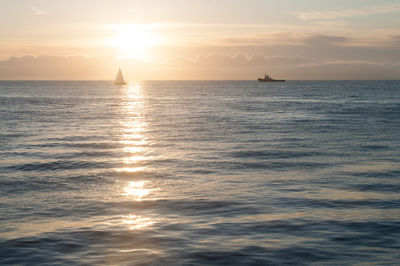 Scenic view of sea against sky during sunset