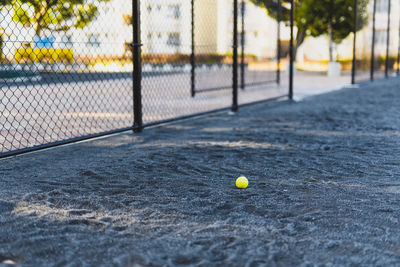 Close-up of tennis ball on field