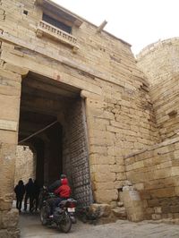 People in front of building