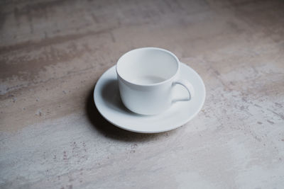 Empty white coffee cup with saucer. high quality photo