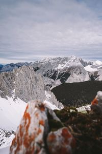 Scenic view of snowcapped mountains against sky