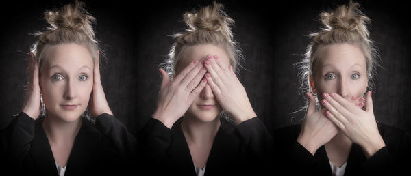 Portrait of beautiful young woman over black background