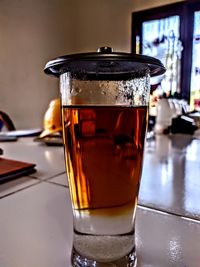 Close-up of tea in glass on table