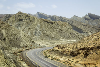 Scenic view of mountain road against sky