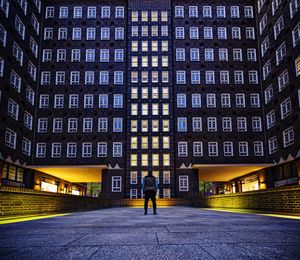 Road passing through city buildings