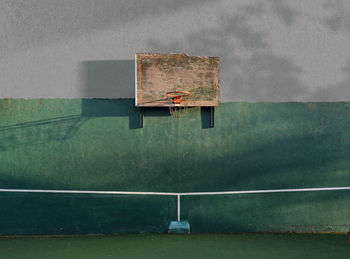 View of basketball hoop against wall