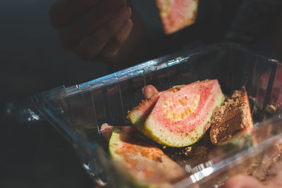 Close-up of person preparing food