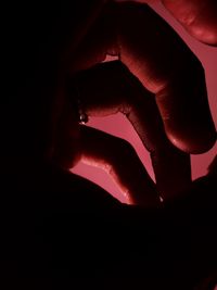Close-up of silhouette hand
