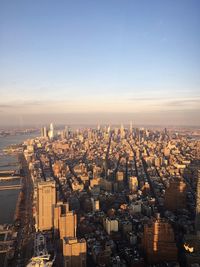 High angle view of city buildings against clear sky