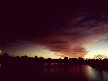 Scenic view of lake at sunset