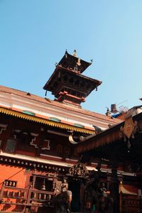 Low angle view of patan durbar square against clear sky in city