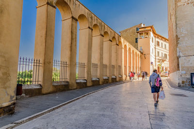 Architectural columns by footpath at palazzo orsini