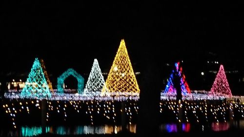 Illuminated christmas tree at night