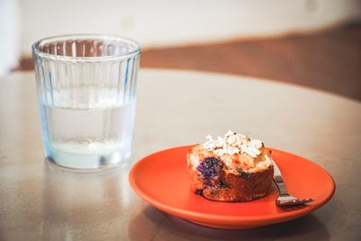 Close-up of ice cream in glass on table