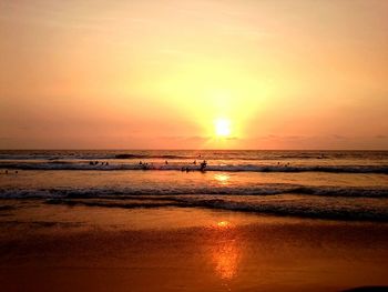 Scenic view of sea at sunset