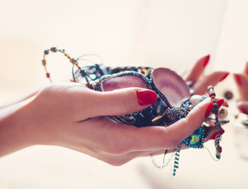 Close-up of woman holding hands