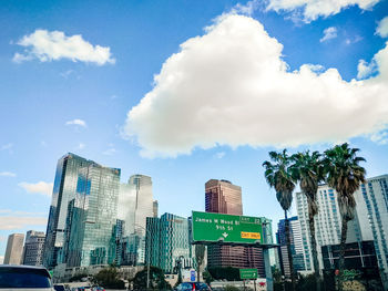 Low angle view of buildings against sky in city