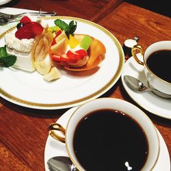 Close-up of coffee served on table