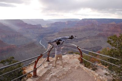 Rear view of woman holding sarong at grand canyon national park