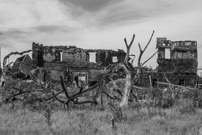 Abandoned building against sky