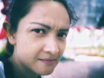 Close-up portrait of young woman