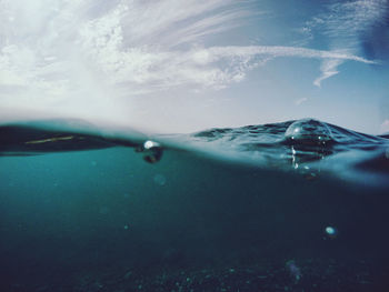 Close-up of water splashing in sea