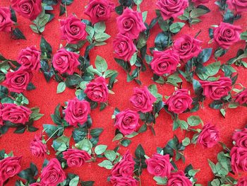 Full frame shot of wall decorated with red roses