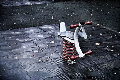 High angle view of toy on footpath