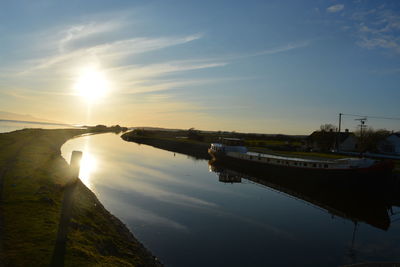 Scenic view of sunset over river