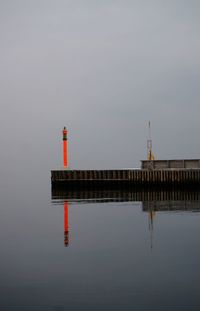 View of lighthouse in water