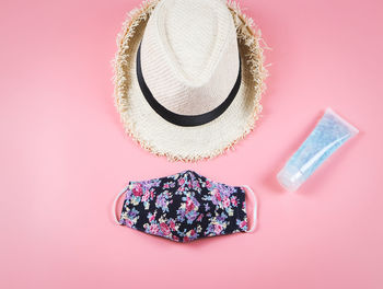High angle view of hat on pink background
