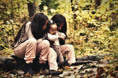 Portrait of children in forest