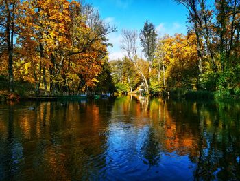 Scenic view of lake against sky during autumn