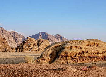 Scenic view of desert against clear sky