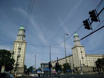 Low angle view of building against blue sky