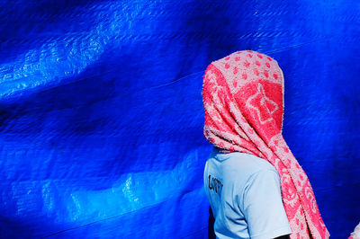 Rear view of woman in swimming pool