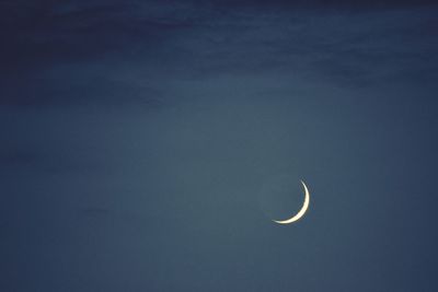 Low angle view of moon in sky