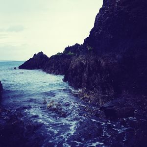 Scenic view of sea against blue sky