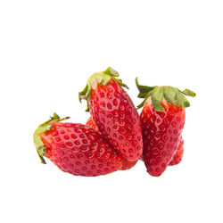 Close-up of strawberry over white background