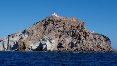 Scenic view of sea against clear blue sky