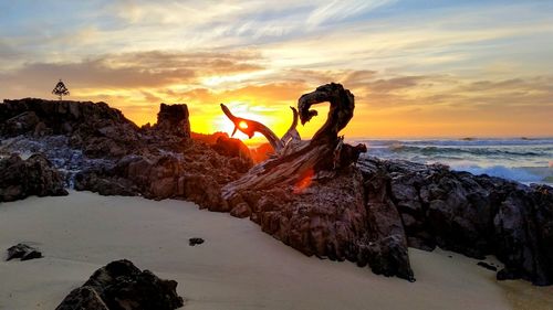 Panoramic view of sea against sky during sunset