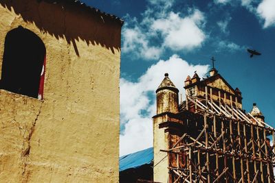 Low angle view of old building against sky