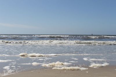 Scenic view of sea against clear sky